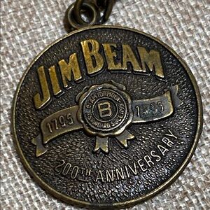 Vintage 1995 200th anniversary Jim Beam Brass Keychain.